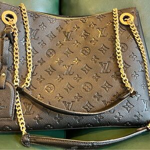 Louis Vuitton Black and Gold Shoulder Bag with Iconic Design